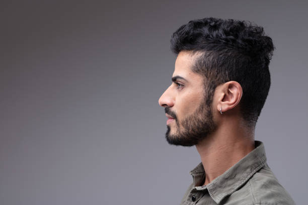 istock Studio profile portrait of young bearded man 999890054