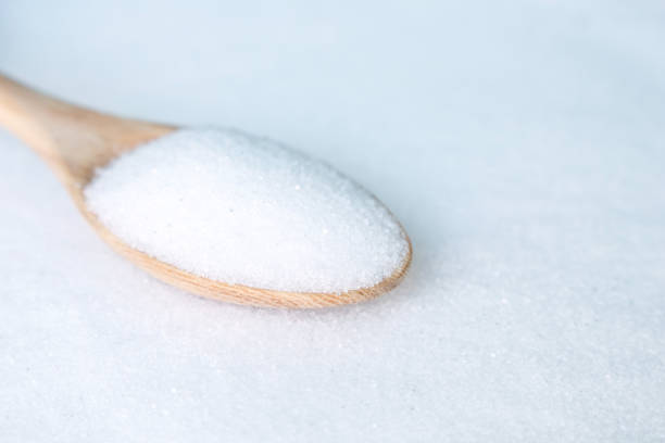 istock salt white  food cooking on spoon and background 999893068