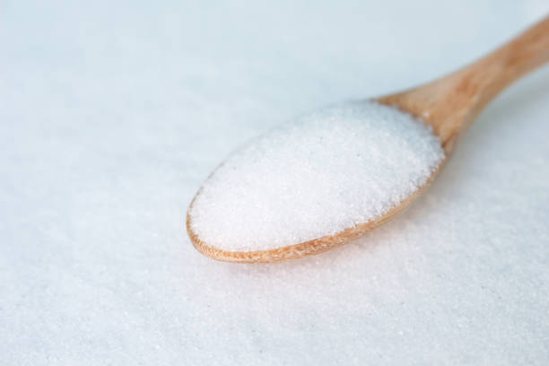 istock salt white  food cooking on spoon and background 999893232