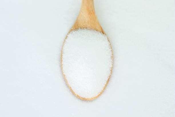 istock salt white  food cooking on spoon and background 999893340
