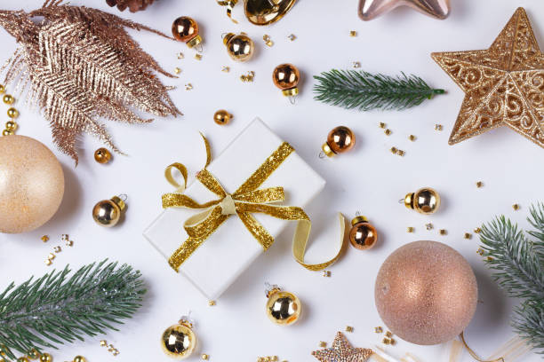istock Christmas flat lay scene with golden decorations 999898724