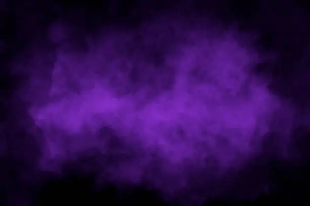 Violet cloud over black background