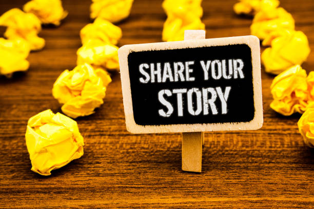istock Handwriting text writing Share Your Story. Concept meaning Experience Storytelling Nostalgia Thoughts Memory Personal White text black paint wooden board clip desk yellow paper notes warning. 999904706