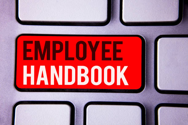 palavra escrita texto manual do funcionário. conceito de negócio para o documento manual regulamentos regras guia diretiva código branco texto duas palavras vermelho guia botão chave imprensa computador teclado trabalho. - occupation handbook human resources recruitment - fotografias e filmes do acervo