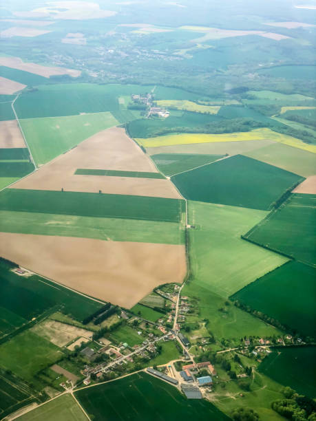 istock View on Paris suburbs from landing airplane 999911012
