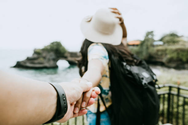 istock Asian couple walking hand from the back 999913486