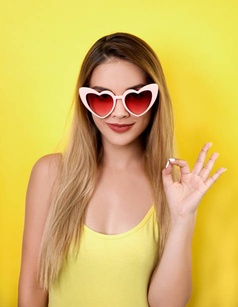 istock Young woman showing ok sign 999914152