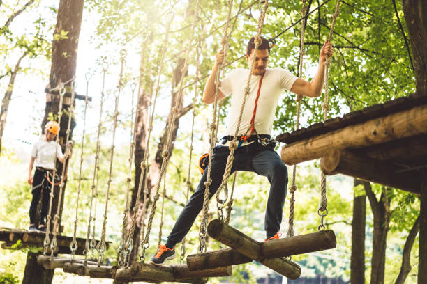 istock Fun couple activities in adventure park 999922232