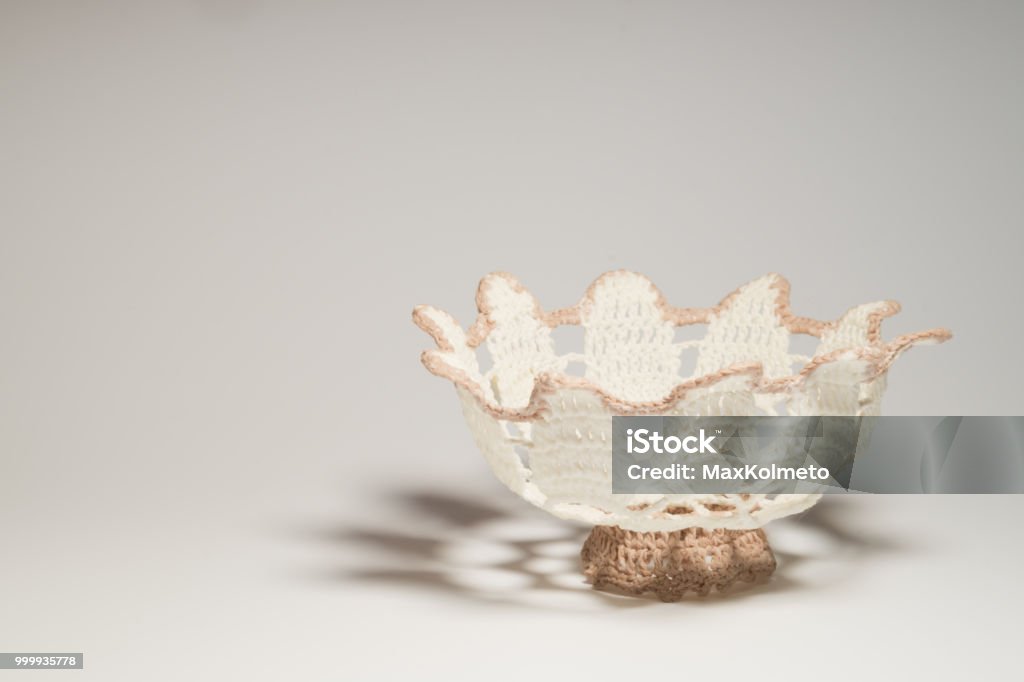 Handmade knitted vase isolated on white Handmade knitting wool texture background closeup needlework Craft Stock Photo