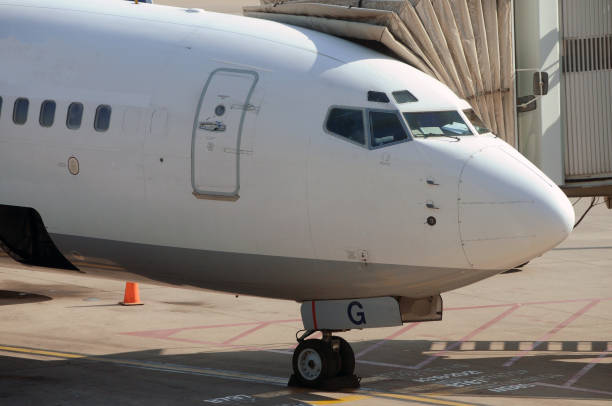 istock airplane at airport dock 999953978