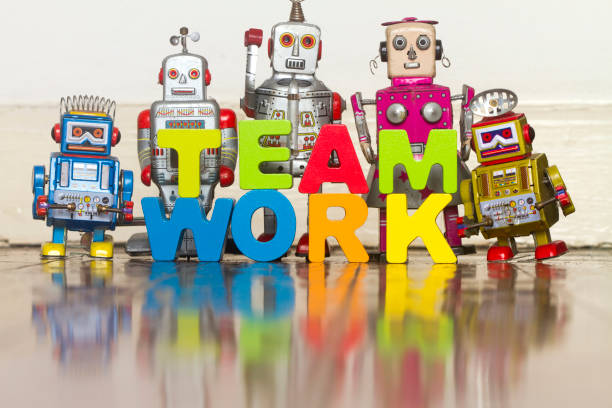 istock the word TEAM WORK  with wooden letters 1 999978504