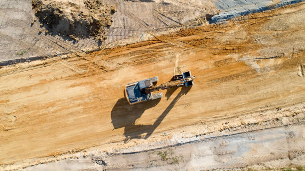Excavator on a construction site, France stock photo