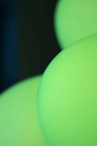 istock Close up on surface of soft green balloon 999979630