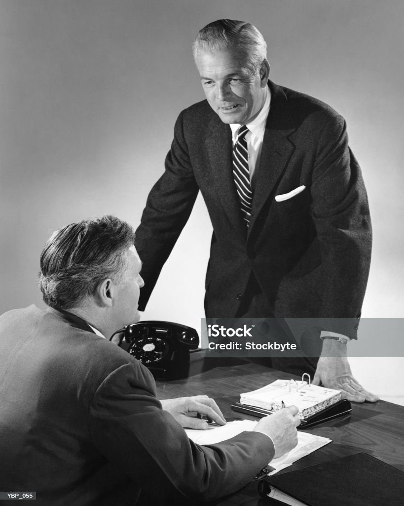 Two men talking  1950-1959 Stock Photo