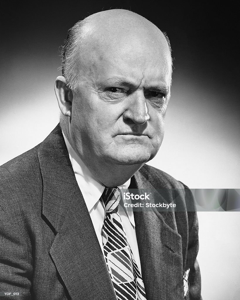 Man frowning  Black And White Stock Photo