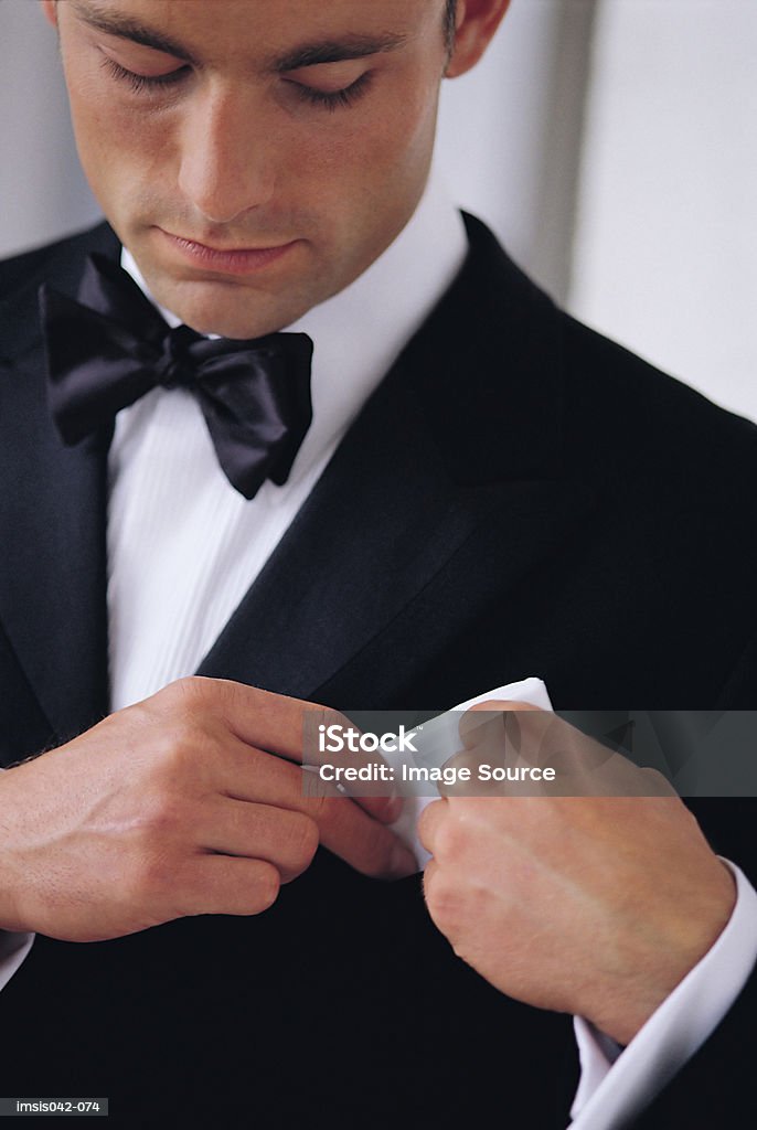 Man in smoking  Adjusting Stock Photo