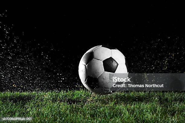 Fußball Ball In Bewegung Auf Gras Stockfoto und mehr Bilder von Fußball - Fußball, Fußball-Spielball, Gras