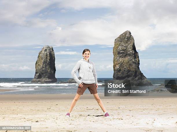 Girl On Beach Stock Photo - Download Image Now - 12-13 Years, Beach, Cannon Beach