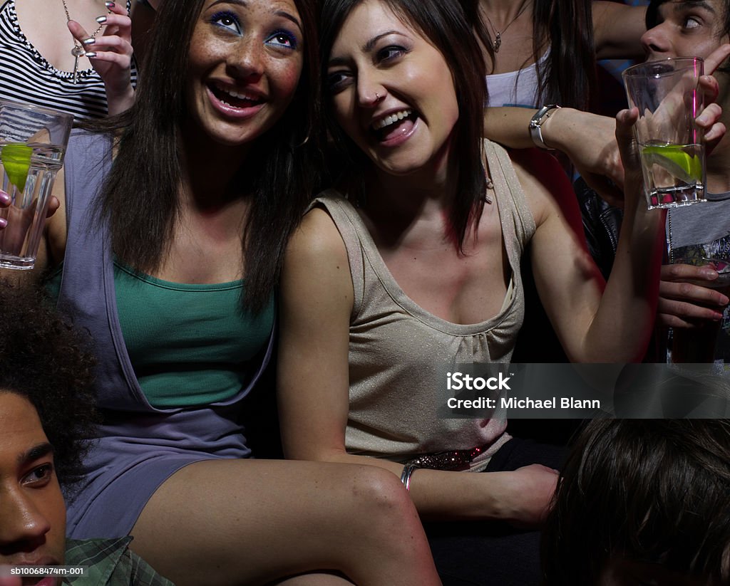 Group of friends drinking at party  Party - Social Event Stock Photo