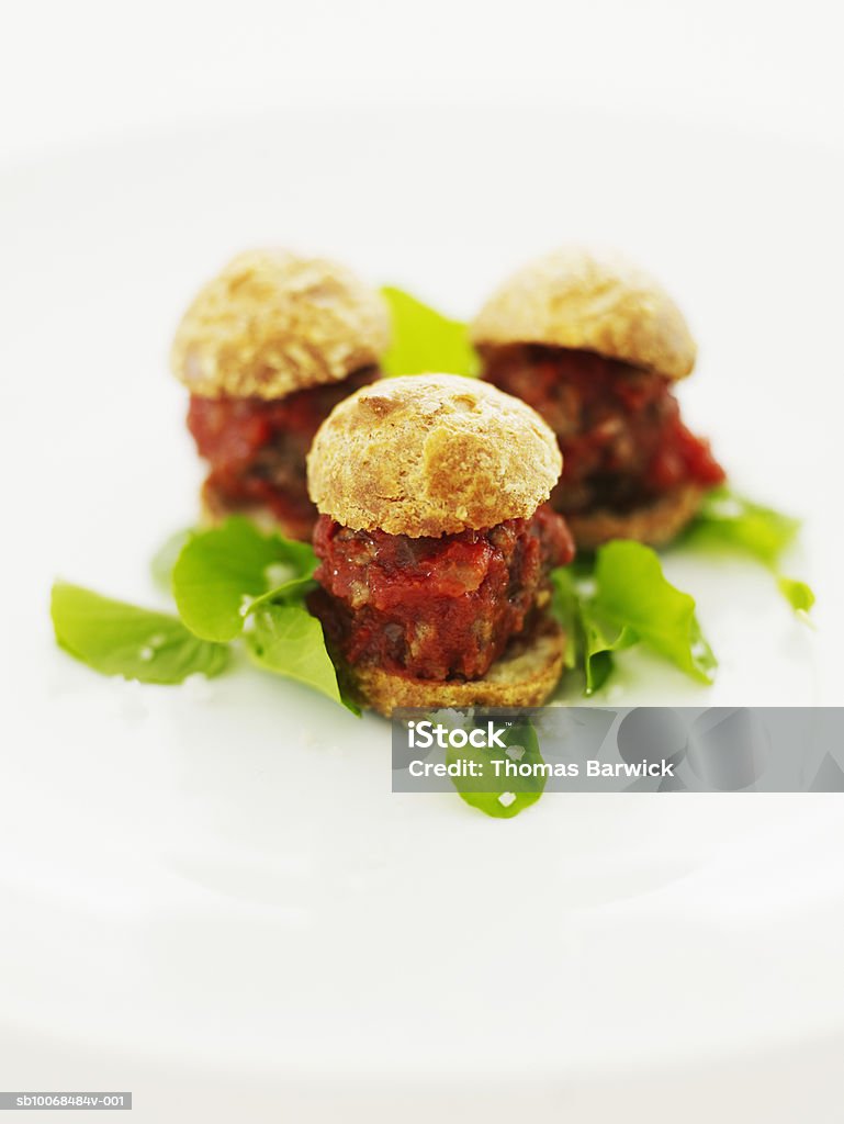 Meatball sliders in gouger pastry with watercress and sea salt, close-up  Close-up Stock Photo