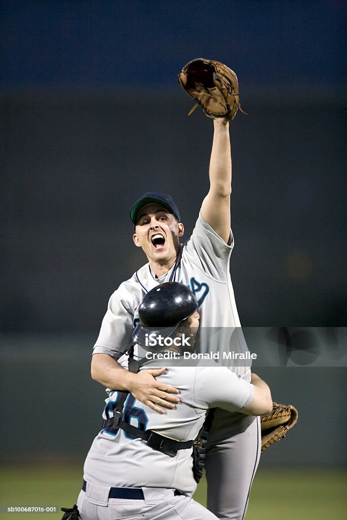 USA, California, San Bernardino, baseball players celebrating victory  Baseball Player Stock Photo