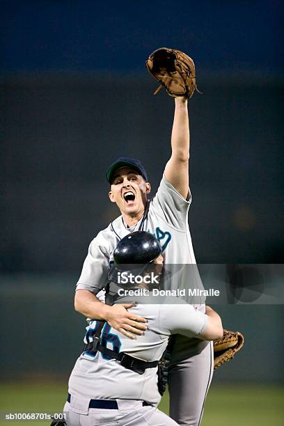 Usa California San Bernardino Baseball Players Celebrating Victory Stock Photo - Download Image Now