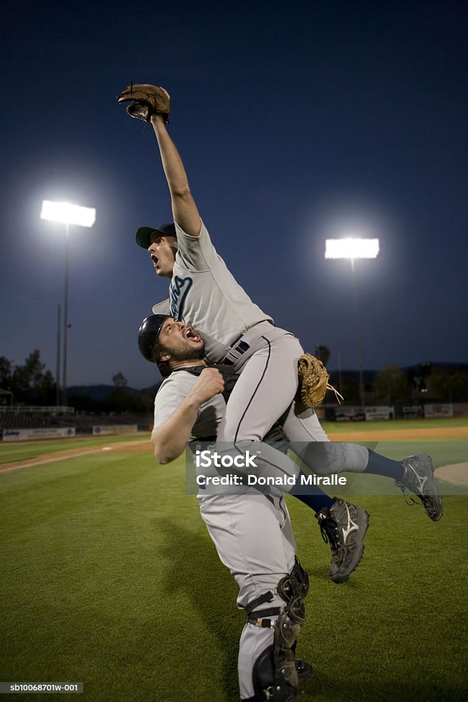 USA, California, San Bernardino, baseball players celebrating victory  Baseball Player Stock Photo