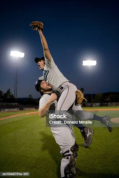 Usa California San Bernardino Baseball Players Celebrating Victory Stock Photo - Download Image Now