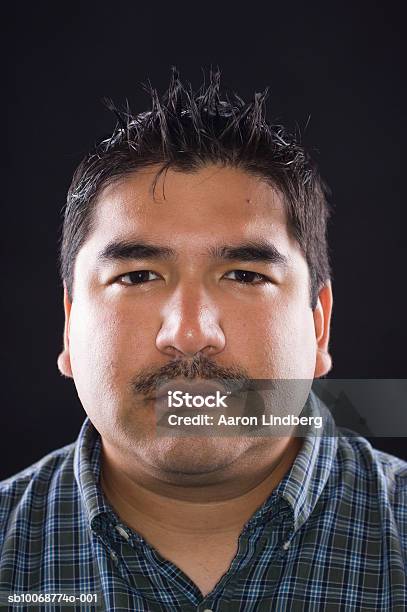 Young Man With Moustache Closeup Portrait Foto de stock y más banco de imágenes de 25-29 años - 25-29 años, Adulto, Adulto joven