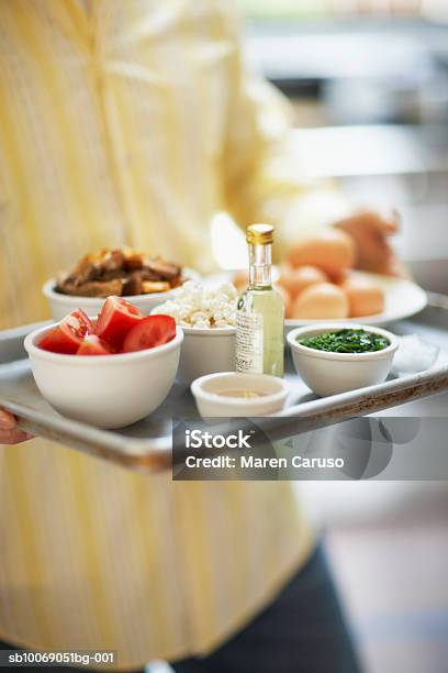 Foto de Man Holding Bowl With Ingredients Mid Section e mais fotos de stock de Bandeja - Bandeja, 30-34 Anos, Adulto