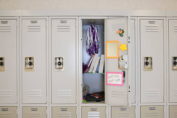 Open locker in high school USA, Washington State, Bellevue, Interlake High School cheerleader photos stock pictures, royalty-free photos & images