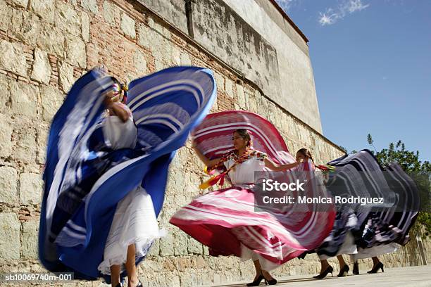 Mexico Oaxaca Istmo Four Women In Traditional Dress Dancing Blurred Motion Stock Photo - Download Image Now