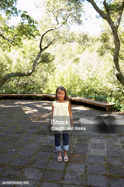 Girl Smiling Portrait High Angle View Stock Photo - Download Image Now - 6-7 Years, Casual Clothing, Cheerful