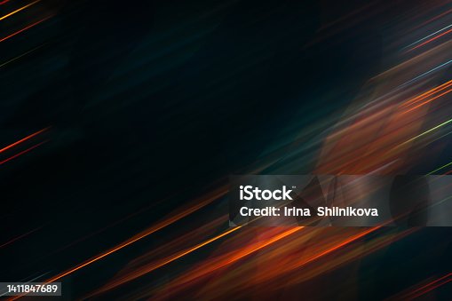 istock abstract black background with neon light lines 1411847689
