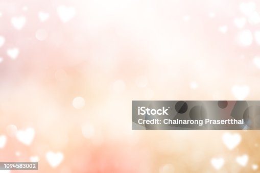 istock abstract blur beautiful pink color gradient and shine flash glowing background with illustration white heart shape light and valentines day 14 february concept 1094583002
