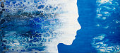 istock Abstract painting with liquid acrylic. Profile of the girl from the sea foam. 1141969161
