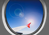 istock Airbus A380  window view on a bright and sunny day above the stratosphere clouds 1367983785
