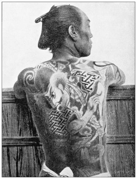 Antique travel photographs of Japan: Tattooed man vector art illustration