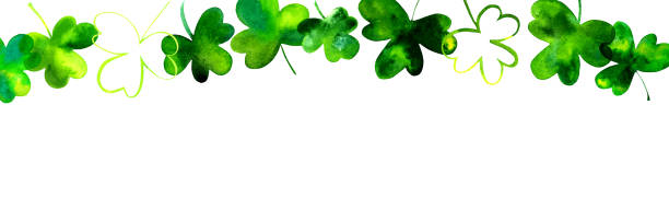 A banner with hand drawn watercolor shamrocks, Irish clovers, on a white background with copy space A banner with hand drawn watercolor shamrocks, Irish clovers, on a white background with copy space march month stock illustrations