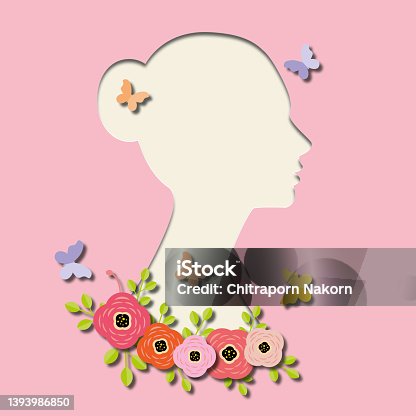 istock Blank paper cut woman with flowers and butterflies on pink background. Concept for Women’s Day or Mother’s Day. 1393986850