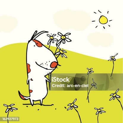 istock Dog with camomiles 163927973