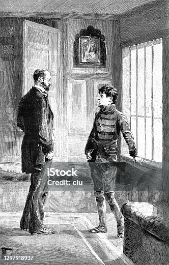 istock Father talking to his son, indoor, at the window 1297918937