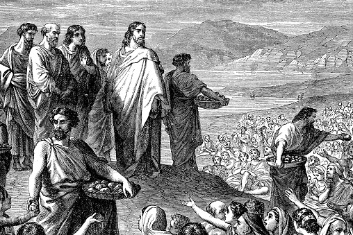 An engraved vintage illustration image of Jesus Feeding of the Multitude, also known as the Feeding of the Five Thousand of the New Testament Bible from a Victorian book dated 1883 that is no longer in copyright