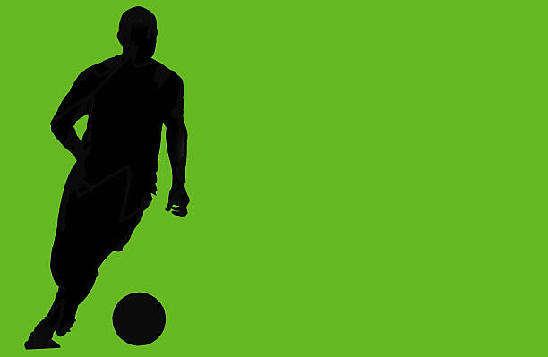 footie 2 "silhouette, cut-out image of a footbal (soccer) player dribbling the ball" soccer silhouettes stock illustrations