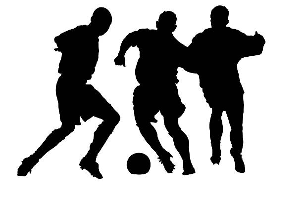 Footy Silhouette 1 A group of Football (Soccer) players dribbling for possession of the ball soccer silhouettes stock illustrations
