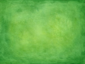 istock Green watercolored painted paper 168400801