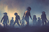 istock Halloween concept of zombie crowd walking at night 806978898