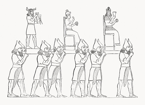 Idols carried in procession by Assyrian warriors. Wood engraving after an ancient bas relief from Nimrud (Iraq), published in 1862.