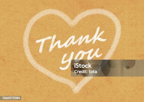 istock Illustration of a heart mark and the word "Thank you" drawn in white on a cork board 1366972084