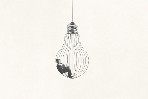 illustration of a man imprisoned inside light bulb thinking about freedom, utopia abstract concept